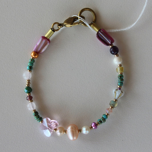Lisa Wilson, purple butterfly bracelet