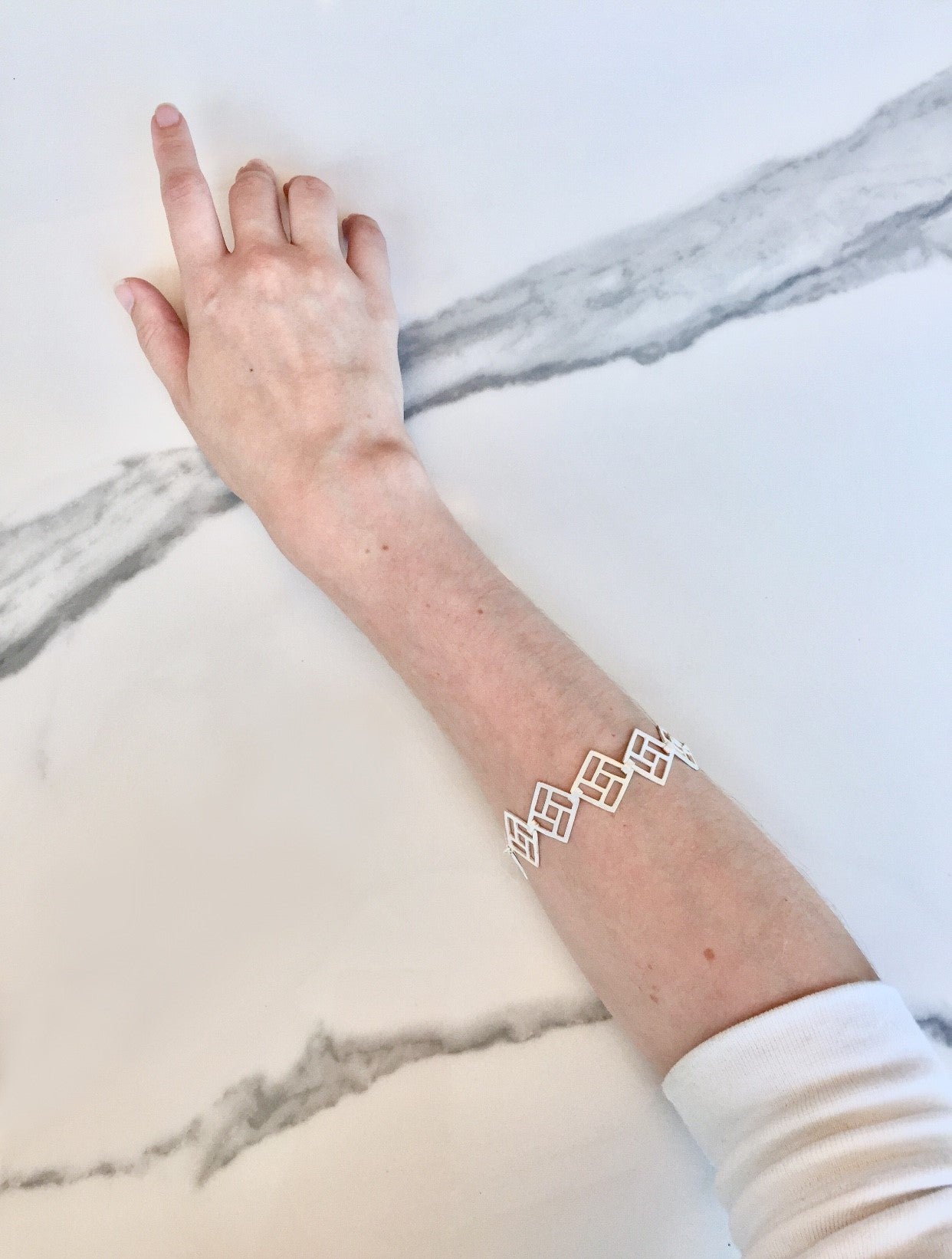 Bracelet à maillons carrés ouverts