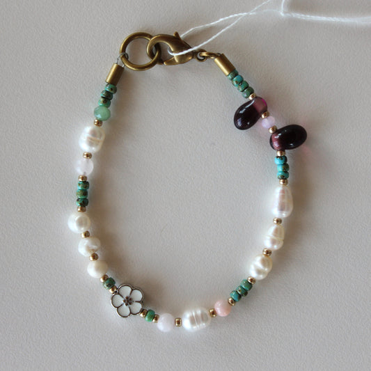 Lisa Wilson, white flower bracelet