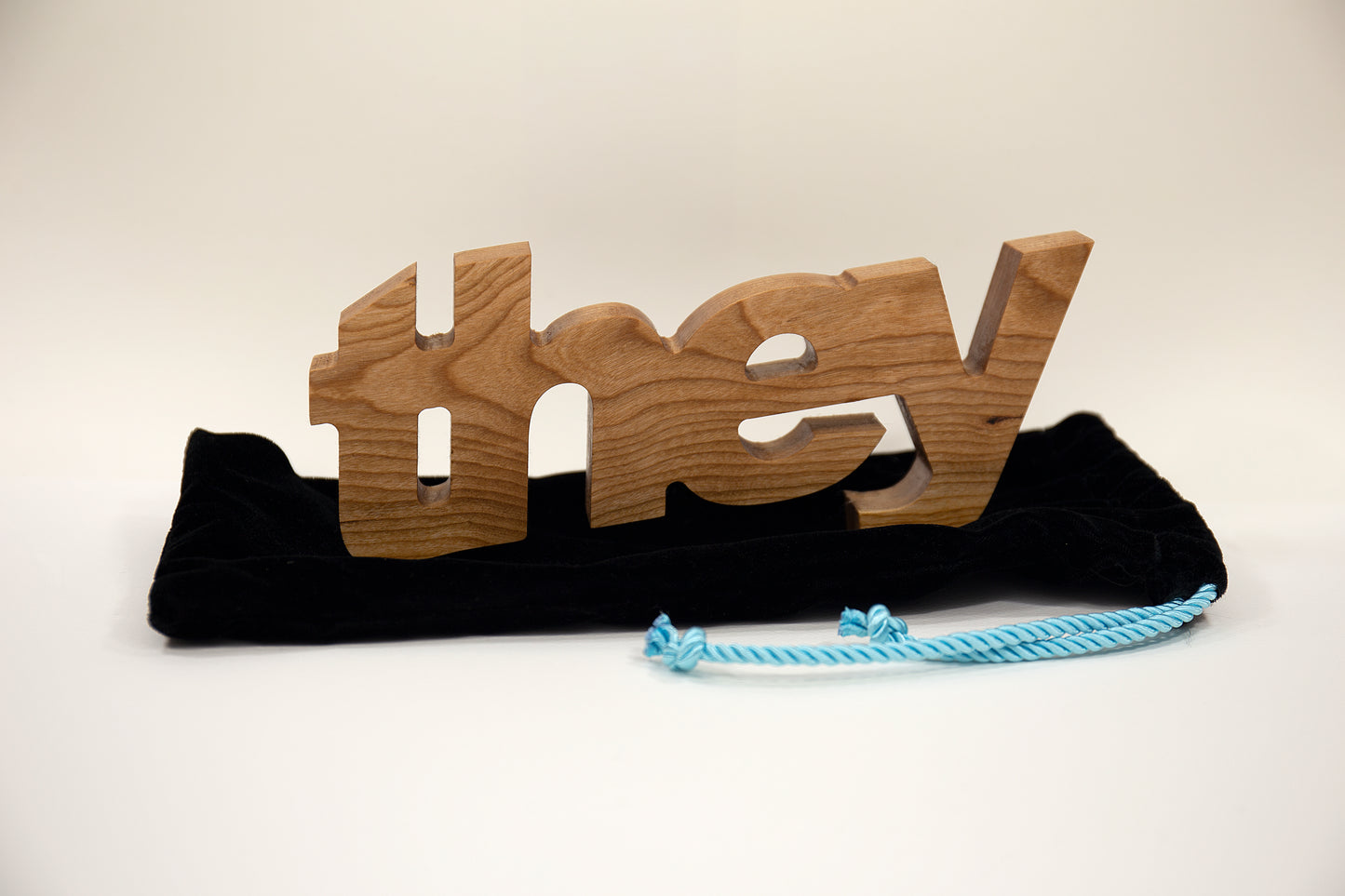 Wooden Pronoun Sculpture "They"