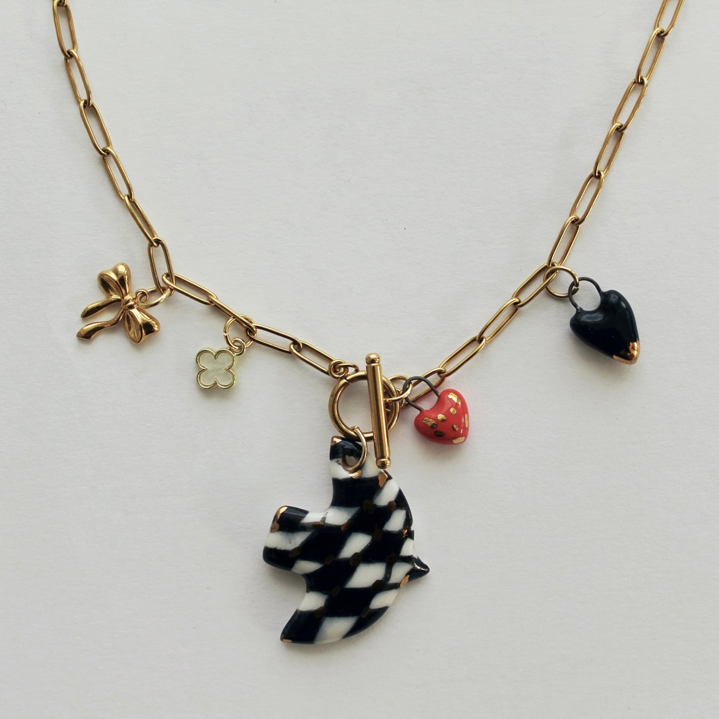 Reversible Porcelain Bird + Assorted Charms Necklace