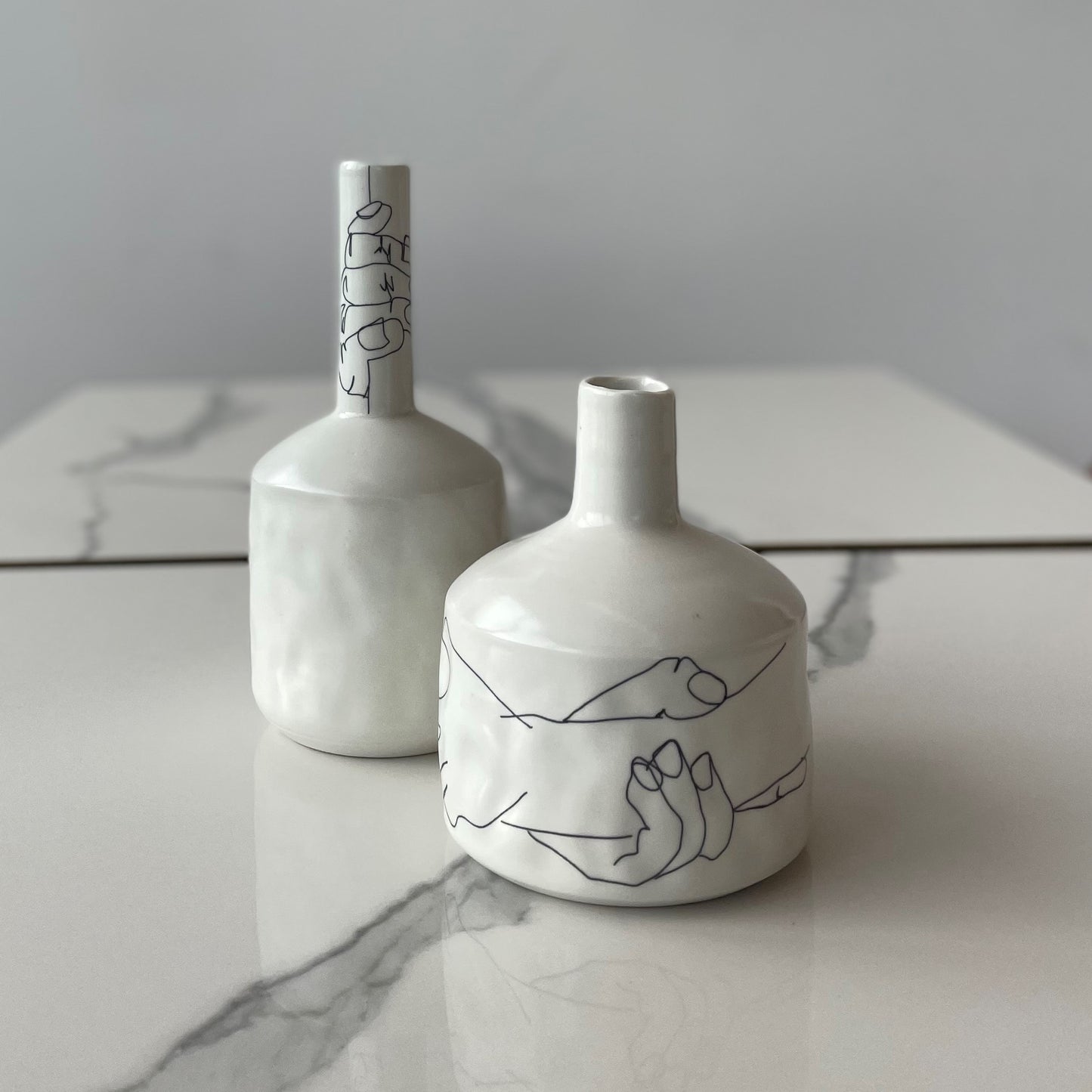 Bottle Vase with abstract hands